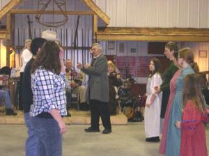 First breaking up Christmas contra dance. Caller John Belshe. Band Sunday Jammers Stringband.