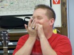 Scott Humphrey playing harmonica.